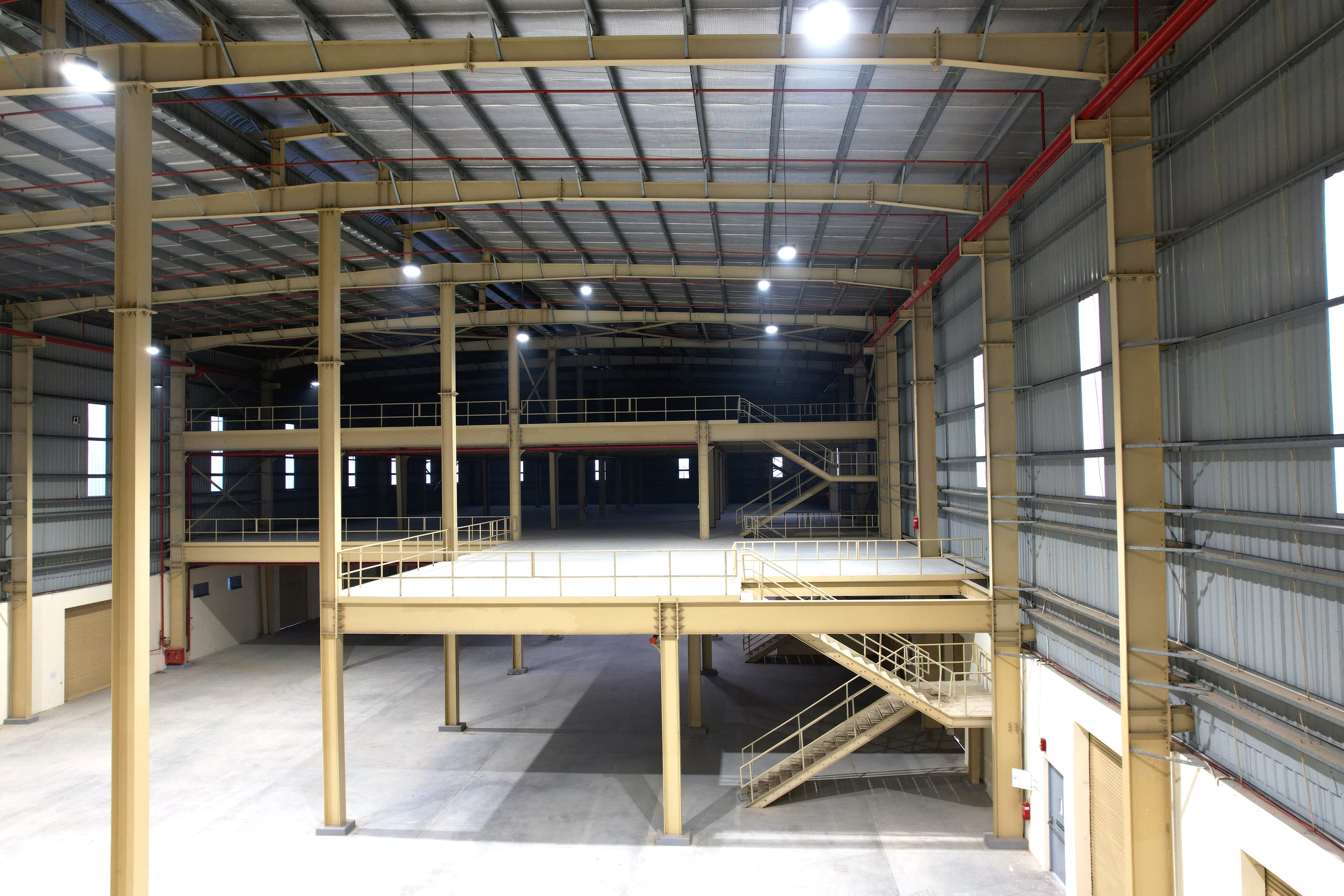 Engineered steel mezzanine system inside an industrial building